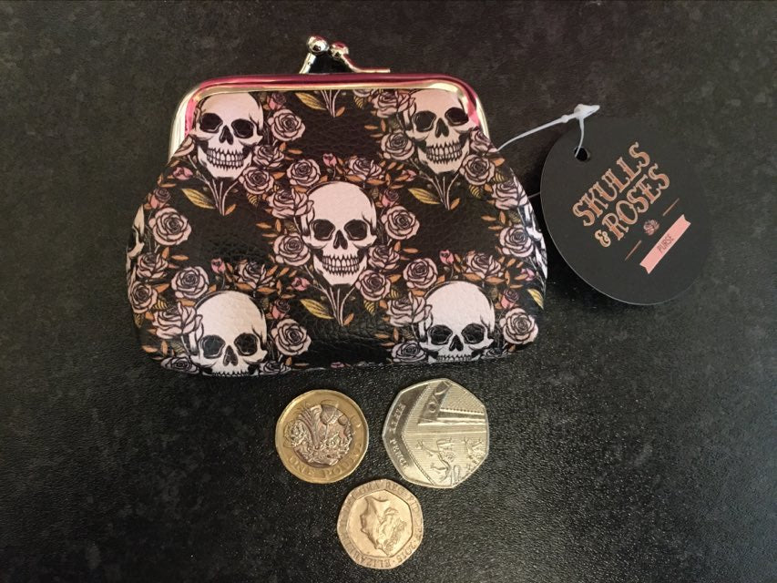 skulls and roses tic tac coin purse multi skull design with coins spilling out