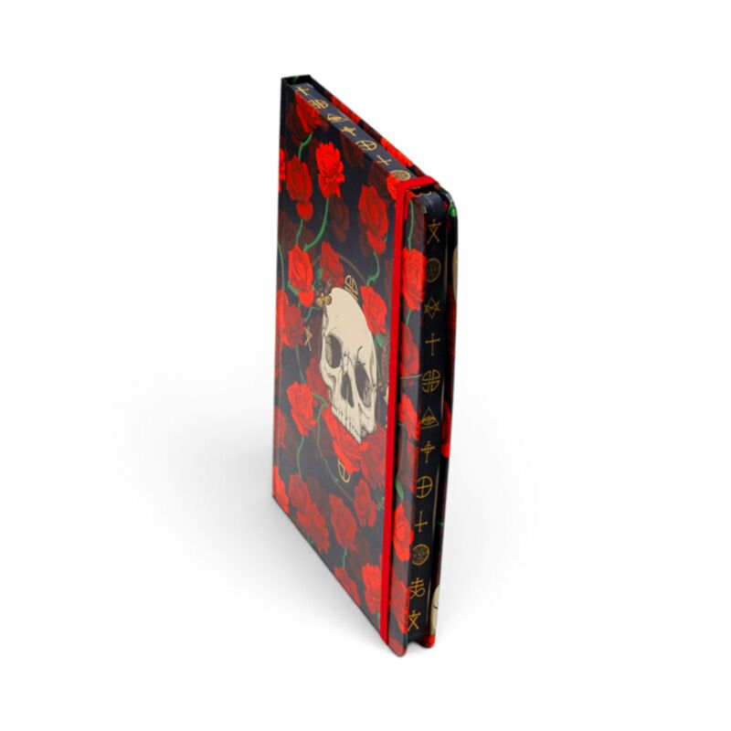 skulls and roses notebook showing paper edging and elastic binder detail