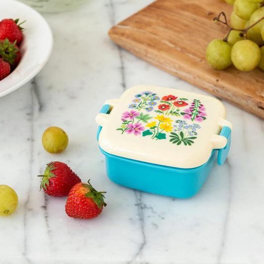Wild flowers design mini snack pot with easy-to-open clips and compact size for snacks.