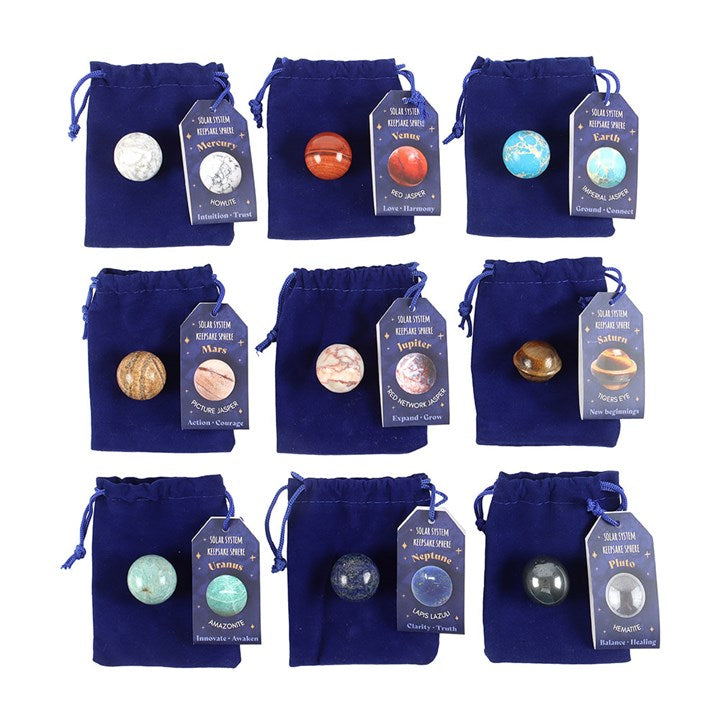 polished solar system gemstone sphere with natural crystal colours and patterns