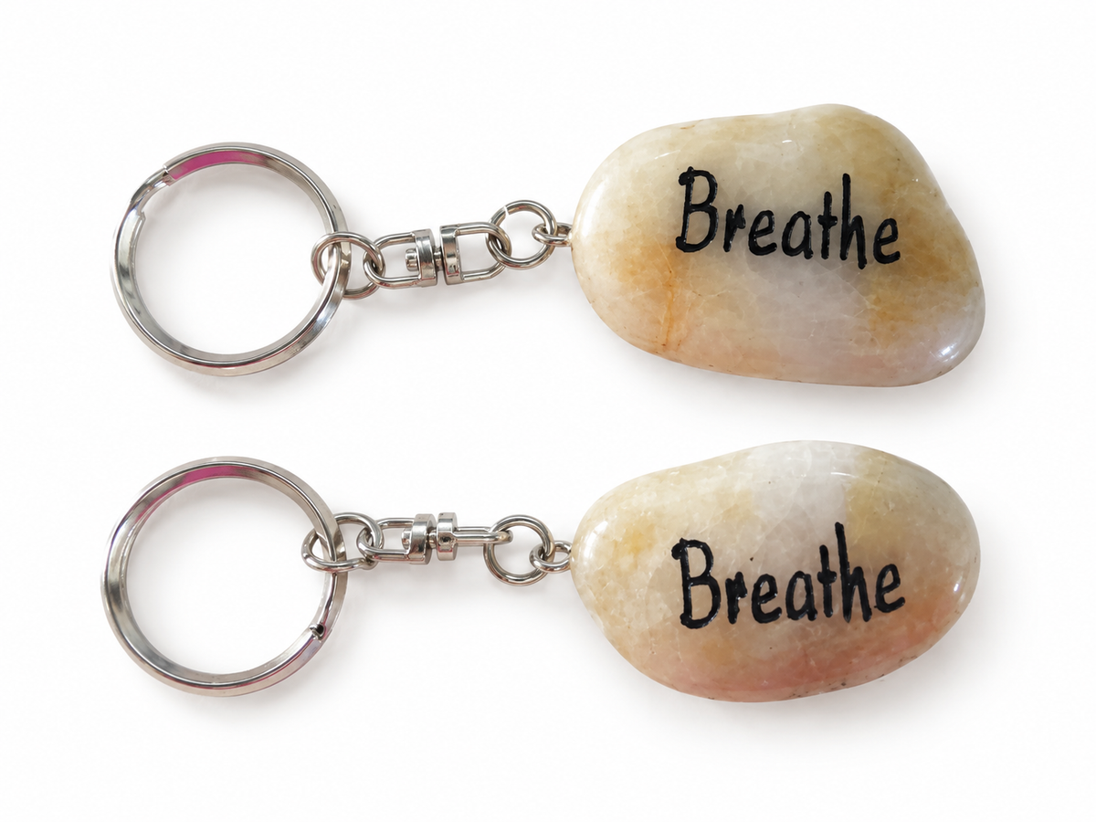 inspirational stone key ring reading breathe