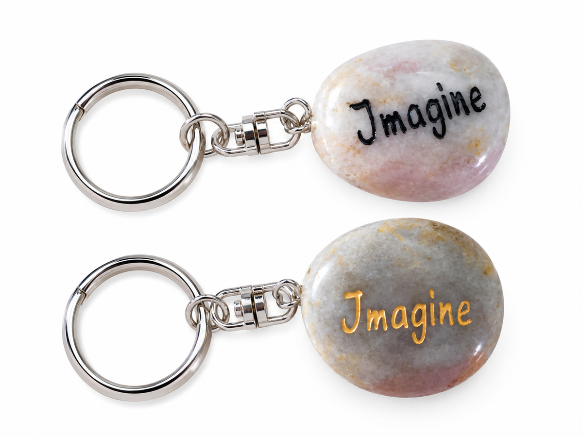 inspirational stone key ring reading imagine