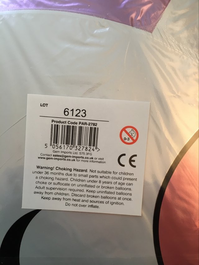 rear view showing safety instructions for inflating unicorn head balloon 