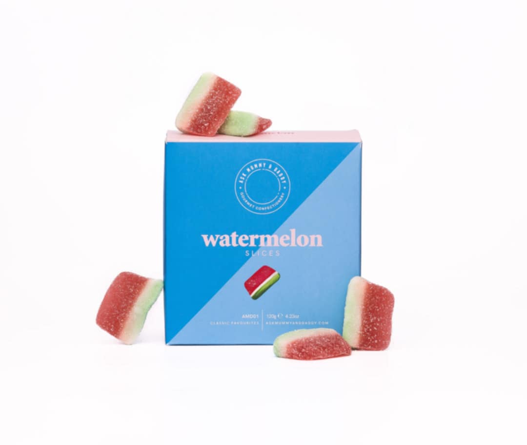 front view of watermelon slices gift box displaying sweets and eco-friendly packaging