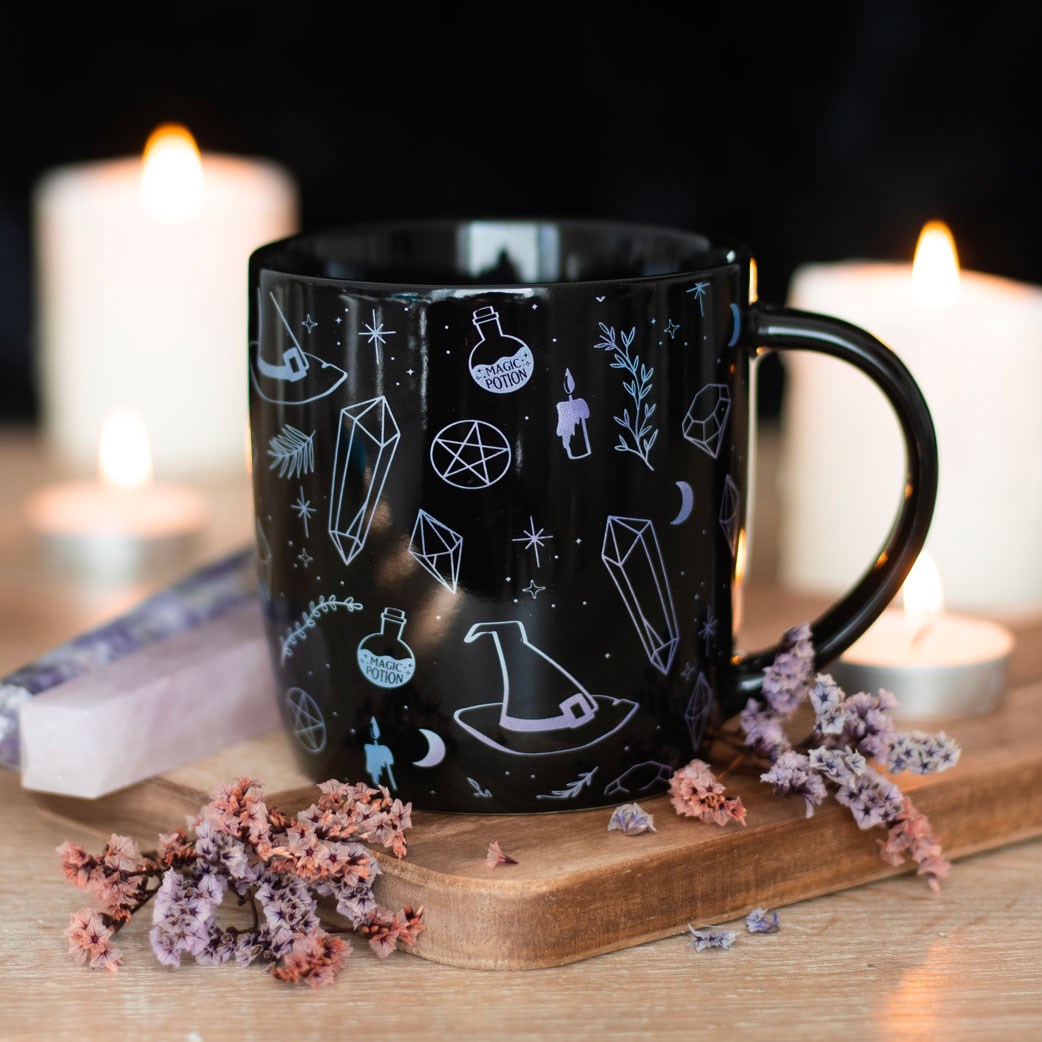 crystal witch ceramic mug featuring a striking black crystal magic design