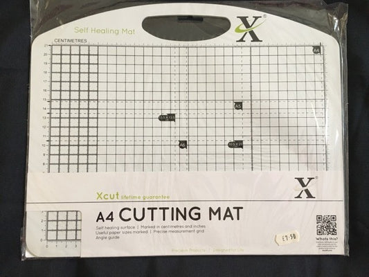 a4 self healing cutting mat with centimetre and inch measurement grid angle guide and paper size markings for crafting and card making