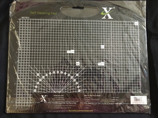 close up view of the a4 self healing cutting mat showing detailed measurement grid paper size guides and angle markings for precise craft cutting