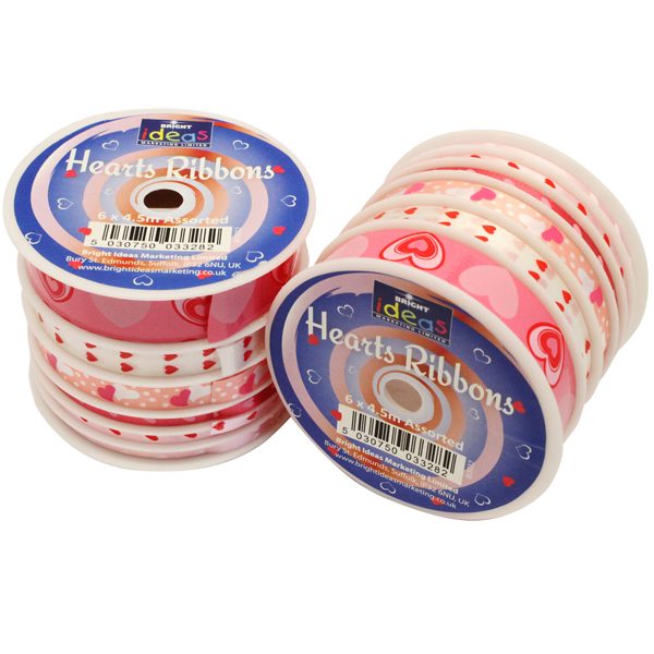 six assorted heart pattern ribbons on spools for gift wrapping and craft projects