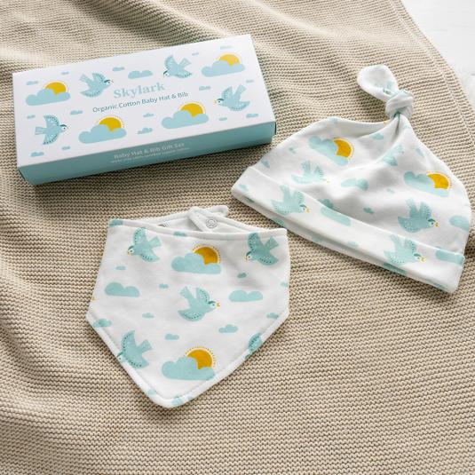 Organic cotton baby hat and bib set with birds design, soft eco-friendly newborn feeding and dribble set