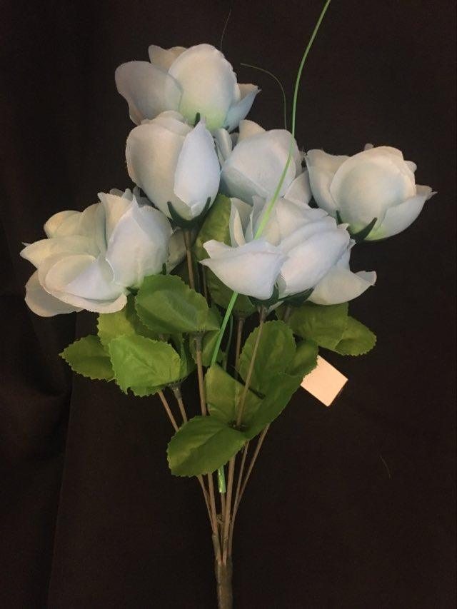 artificial silk rose flower bunch arranged as a single bunch for vase display
