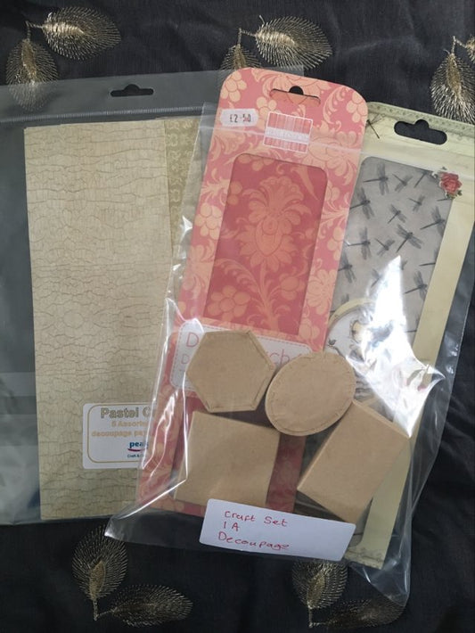 decoupage craft set with patterned papers and assorted small boxes for decorative projects