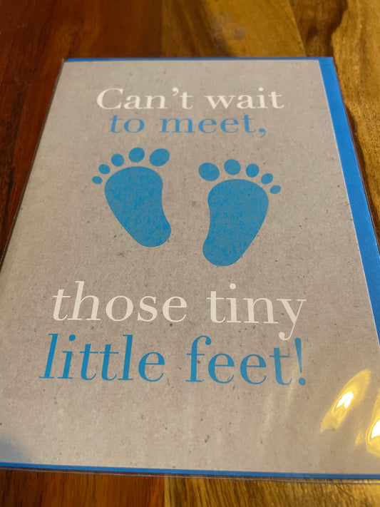 tiny feet new baby card featuring baby feet in soft blue tones with a calm, classic color palette
